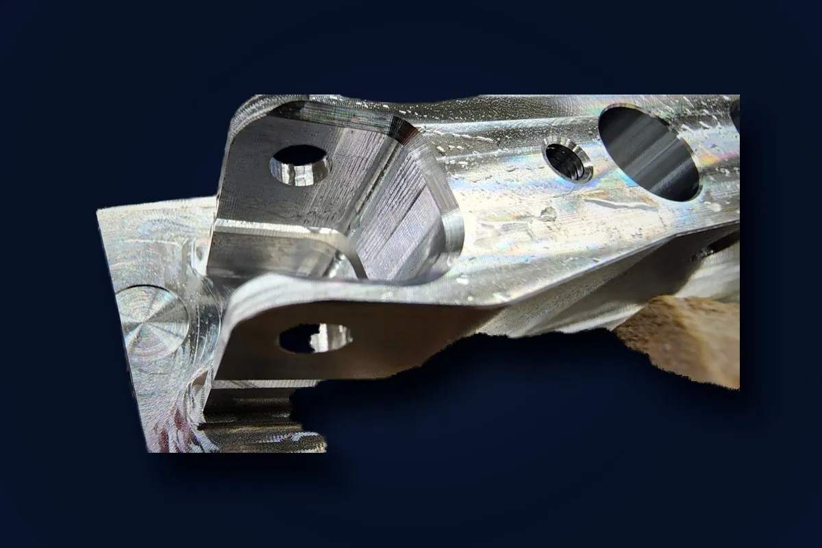 Precision-machined aluminum structural bracket — TPM production work