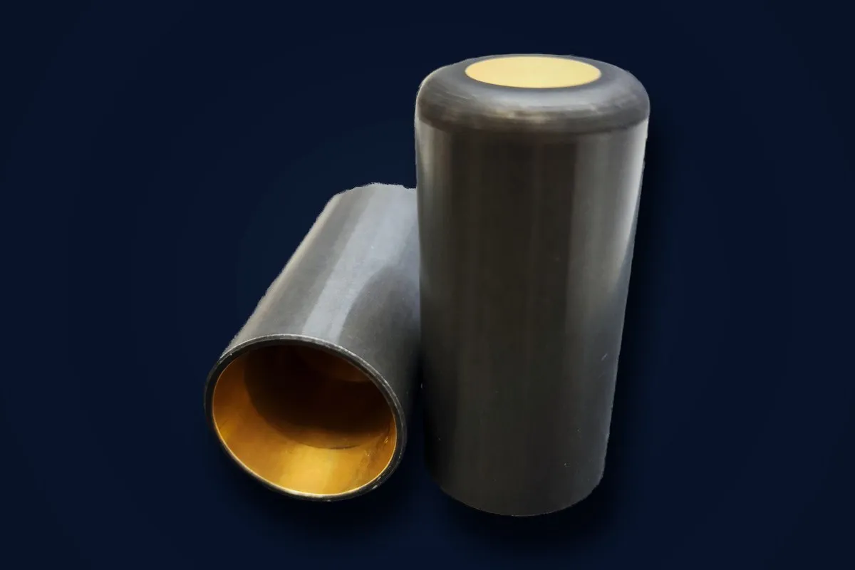 Turned brass cylinders, coated and masked
