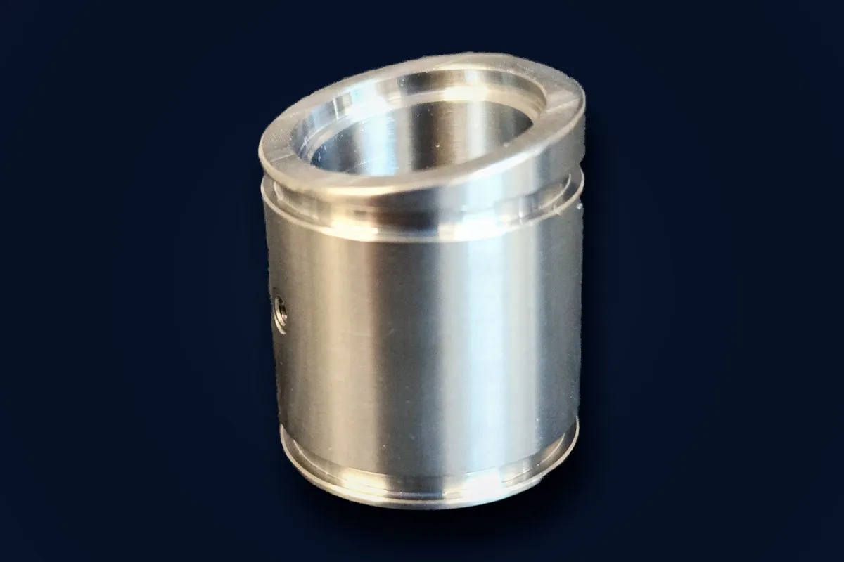 Turned lens sleeve coupler